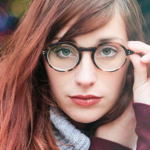 Red Haired Girl with Glasses