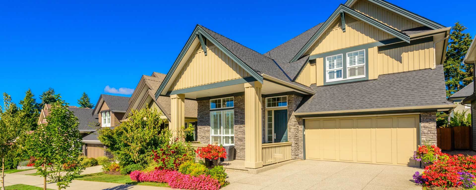 Beige home with blue sky