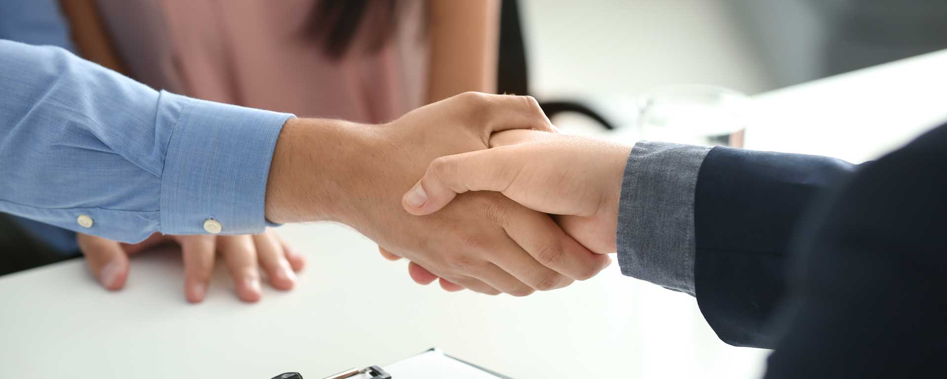 Two people shaking hands